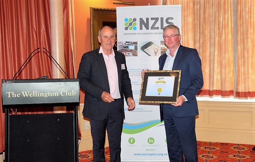 Steve Critchlow honoured as NZIS Fellow.